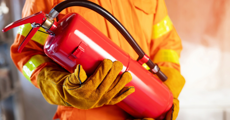 firefighter with fire extinguisher west houston texas