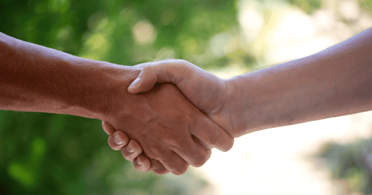 Why We Charge a Consultation Fee If Services Aren’t Booked - houston pet sitter and pet parent sharing hands