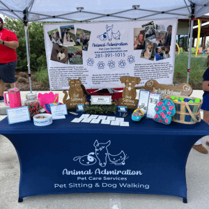 animal admiration pet care at katy dog park vendor table