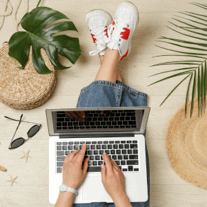 Book Your Katy, Cypress, Fulshear Pet Sitter Now! pet parent traveling with computer